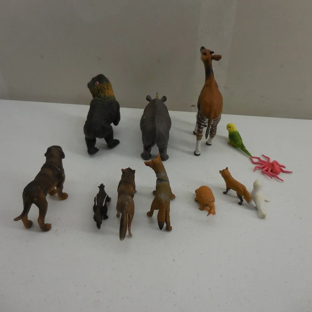 Mixed Lot 11‎ Plastic Toy Animal Figures Rhino Okapi Mandrill Wolf Dog Skunk Fox
